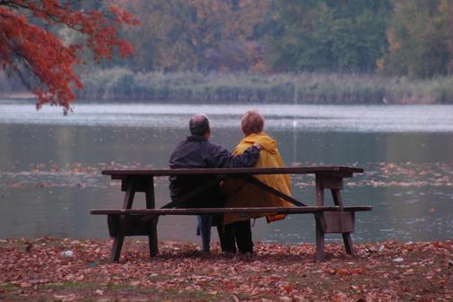 Two People on a Bench by Lake Ann