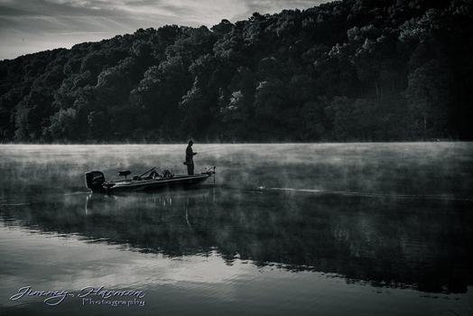 A Person Rowing Boat on Lake Avalon