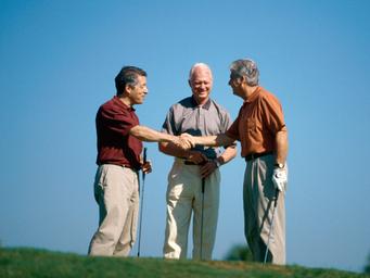 Three Golfers Shaking Hands at Brittany Golf Course