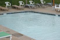 Swimming Pool and Chairs