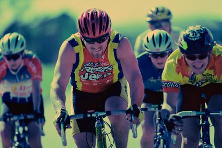 Group of Cyclists Cycling in a Race